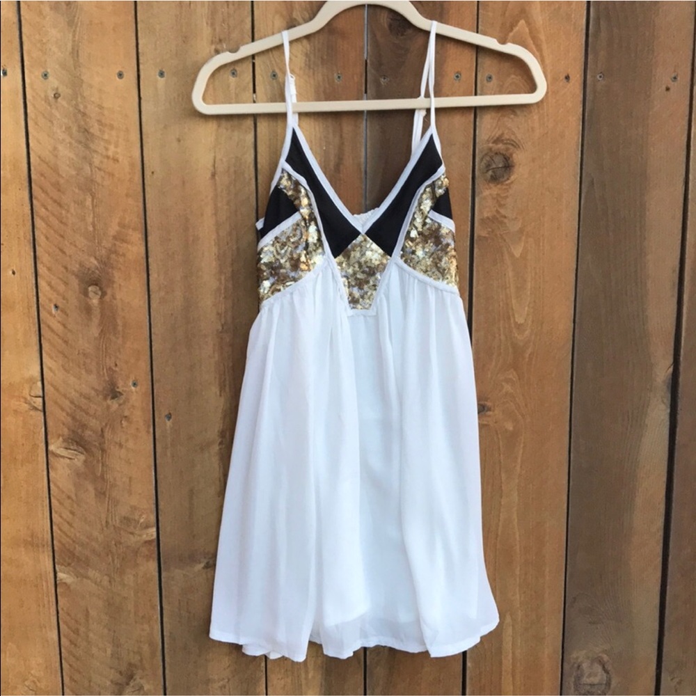 Beautiful white, black and sequin dress from Xenia